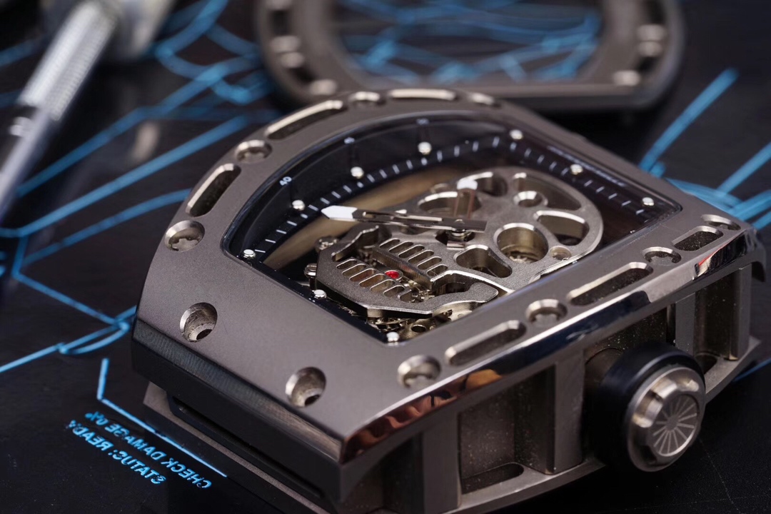 4 - Replica Rolex|Fake Rolex|the best rolex watch factory Skeleton watch movement with exposed gears and screws inside a metal case on a dark blue work surface