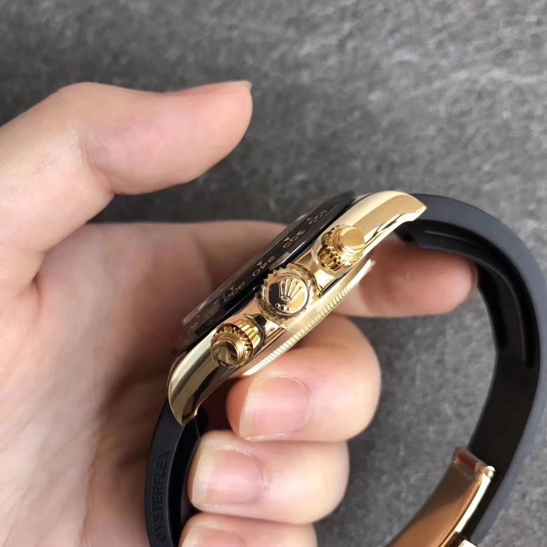 5 - Replica Rolex|Fake Rolex|the best rolex watch factory Gold-toned wristwatch with three crown/pushers and a black rubber strap, shown in side view.
