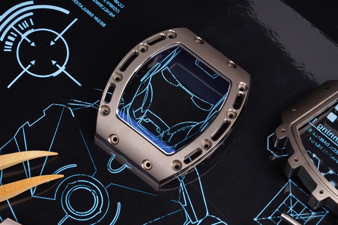 6 - Replica Rolex|Fake Rolex|the best rolex watch factory Rugged square smartwatch with a metallic bezel and blue circuit-like display on a dark blueprint-patterned surface.